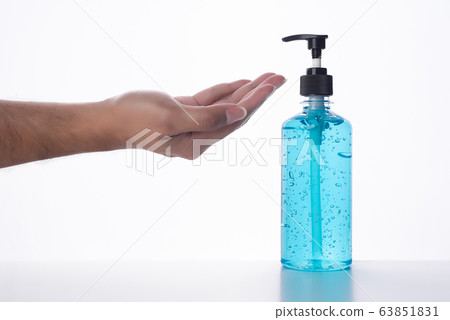 Hand of man that applying alcohol gel to make cleaning and clear germ, 63851831