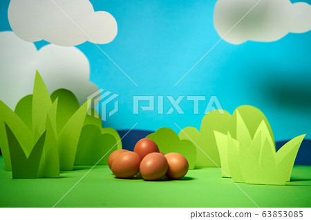 beautiful green spring background with easter eggs 63853085