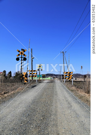 Countryside railroad crossing Countryside railroad crossing 63853482