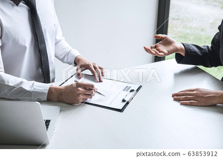 Employer arriving for a job interview, committee 63853912