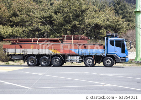 A truck loaded with iron cargo and stopped at a highway rest area A truck loaded with iron cargo and stopped at a highway rest area 63854011