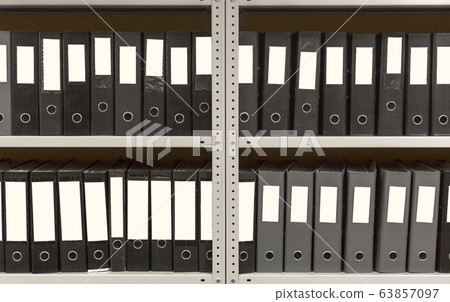 A lot of folders in the archive shelf. 63857097