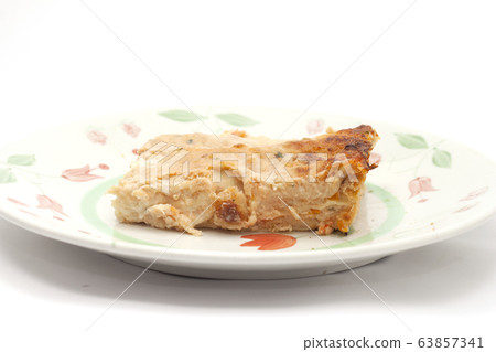 baked pasta with fish with its aluminum tray 63857341
