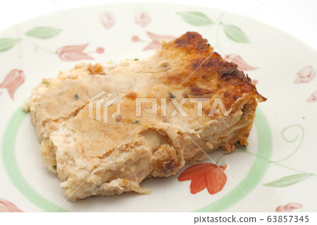 baked pasta with fish with its aluminum tray 63857345