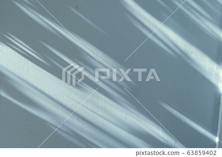 Shadows on the wall, sunshine and sun rays on summer day at sunset, nature and abstract Shadows on the wall, sunshine and sun rays on summer day at sunset, nature and abstract 63859402