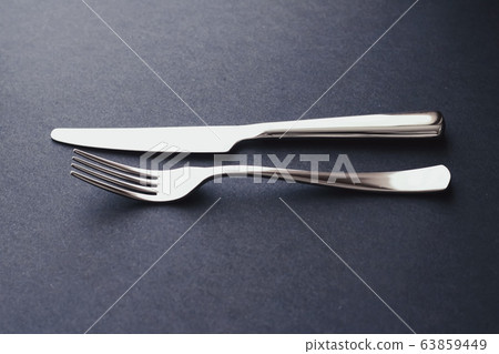 Fork and knife, silver cutlery for table decor, minimalistic design and diet Fork and knife, silver cutlery for table decor, minimalistic design and diet 63859449