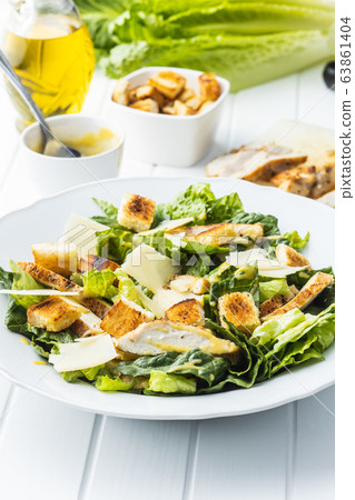 Chicken Caesar Salad with Cheese and Croutons 63861404