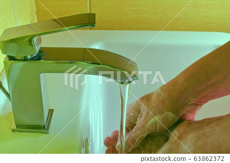 Coronavirus prevention washing hands with soap and hot water. Hand hygiene for coronavirus outbreak. Protection by washing hands. Coronavirus prevention washing hands with soap and hot water. Hand hygiene for coronavirus outbreak. Protection by washing hands. 63862372
