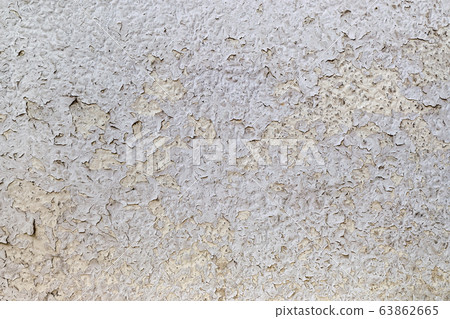 Texture of cracked gray paint on an old weathered wall. 63862665
