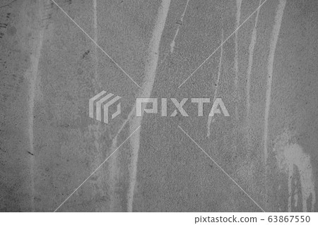 Close-up of White cement crack wall and peeled paint caused by water and sunlight. Peel wall of White house paint with black stain. Black and White of Texture background. Close-up of White cement crack wall and peeled paint caused by water and sunlight. Peel wall of White house paint with black stain. Black and White of Texture background. 63867550