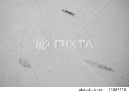 Close-up of White cement crack wall and peeled paint caused by water and sunlight. Peel wall of White house paint with black stain. Black and White of Texture background. 63867556