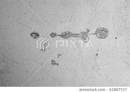 Close-up of White cement crack wall and peeled paint caused by water and sunlight. Peel wall of White house paint with black stain. Black and White of Texture background. 63867557