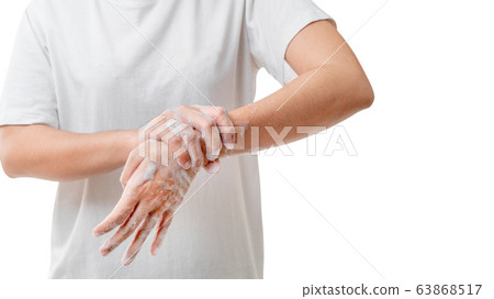 Asian woman hand wash her hand with soap foam for 63868517