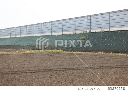 Weed protection sheet on national road 63870658