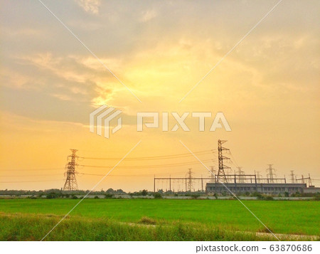 High voltage transmission Electric towers on countryside High voltage transmission Electric towers on countryside 63870686