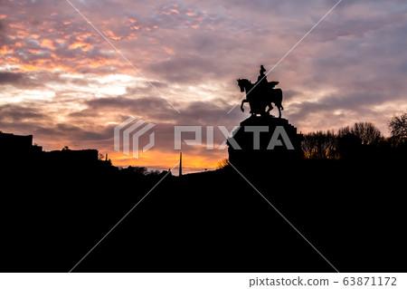 Colorful Sunrise burning sky Koblenz City historic monument German Corner where river rhine and mosele flow together Colorful Sunrise burning sky Koblenz City historic monument German Corner where river rhine and mosele flow together 63871172