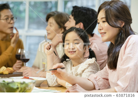 Family, man and woman, eating Family, man and woman, eating 63871816