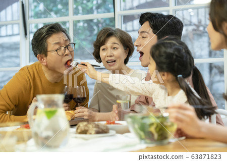 Family, man and woman, eating 63871823