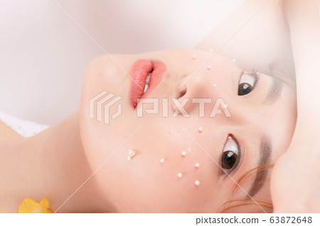 Woman beauty flowers 63872648