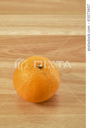 Fresh orange fruit on wooden table Fresh orange fruit on wooden table 63873607