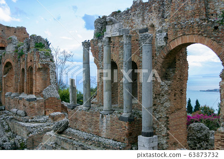 Ruins of ancient Greek theatre in Taormina, 63873732