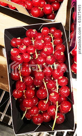 Natural background, red currant berries. Close-up. 63875495