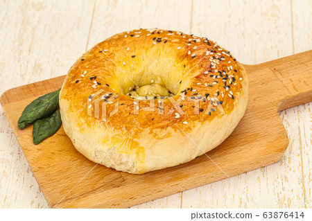 Hot tasty Uzbek flatbread for snack Hot tasty Uzbek flatbread for snack 63876414