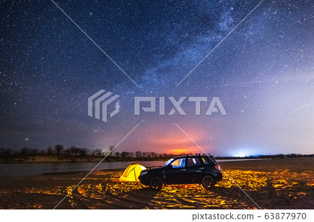 Night camping at the river. The Milky Way in the Night camping at the river. The Milky Way in the 63877970