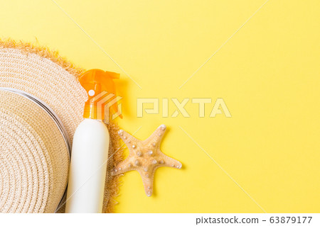 Sunscreen bottles with starfish and sunhat on Sunscreen bottles with starfish and sunhat on 63879177