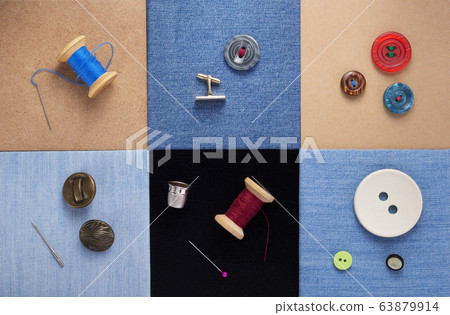 sewing tools and accessories on jeans background sewing tools and accessories on jeans background 63879914