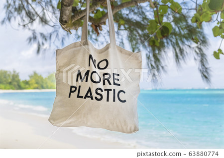 No More Plastic eco bag on  tree brunch with sandy 63880774
