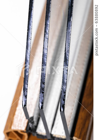 Plastic window profile with triple glazing 63880892