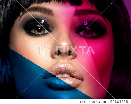 Glamour fashion model with black gloss make-up. 63881318