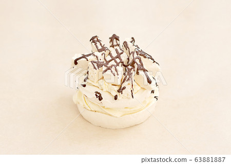 Meringue drizzled with chocolate, an assortment of 63881887