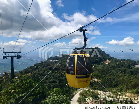 Cable car skyline to Ba Na Hills mountain landmark in Danang, Vietnam Cable car skyline to Ba Na Hills mountain landmark in Danang, Vietnam 63881995