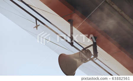 Antibacterial and antiviral treatment of toll roads in Thailand. Spraying chemical fluid over cars. Disinfection of vehicles roads. Pandemic covid-19. 63882561