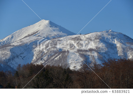 Take a photo of Niseko Annupuri in Niseko town in Hokkaido in early spring 63883921