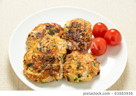 Chicken pickata. Served with mini tomatoes. Chicken pickata. Served with mini tomatoes. 63883936