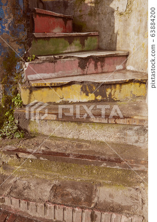 Old shabby rainbow spiral staircase in Istanbul. 63884200