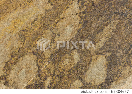 The texture of the stone is shot close up of ordinary sandstone. The texture of the stone is shot close up of ordinary sandstone. 63884687