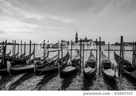 Italy, Venice - 2020. Grand Canal with gondolas. View of the island of Giudecca. Italy, Venice - 2020. Grand Canal with gondolas. View of the island of Giudecca. 63885347