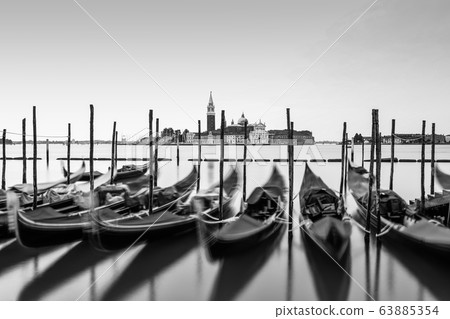 Italy, Venice - 2020. Grand Canal with gondolas. View of the island of Giudecca. Italy, Venice - 2020. Grand Canal with gondolas. View of the island of Giudecca. 63885354