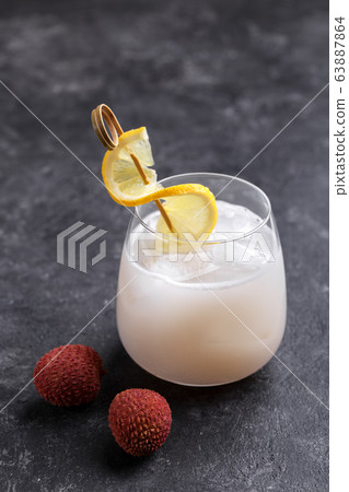 Glass of fresh cold lychee juice 63887864