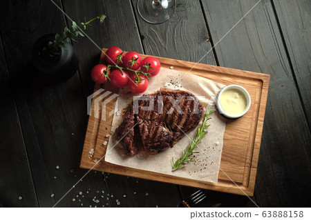 Glass of cold beer with appetizer. catering menu 63888158