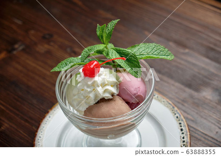 Colored ice cream balls . Restaurant menu 63888355