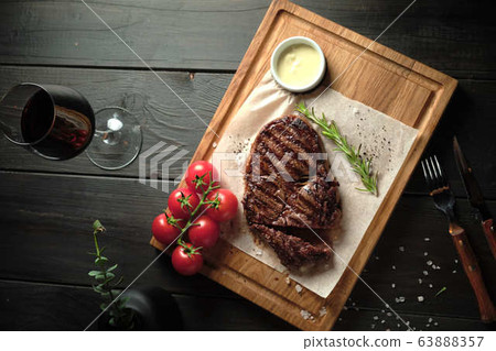 Glass of cold beer with appetizer. catering menu 63888357