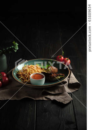 Meatloaf with potatoes straws . catering menu 63889634