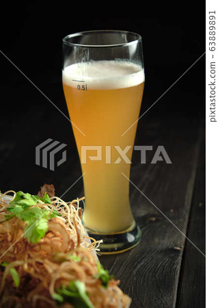 Glass of cold beer with appetizer. catering menu Glass of cold beer with appetizer. catering menu 63889891