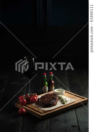 Meat steak on a wooden board. catering menu Meat steak on a wooden board. catering menu 63890111