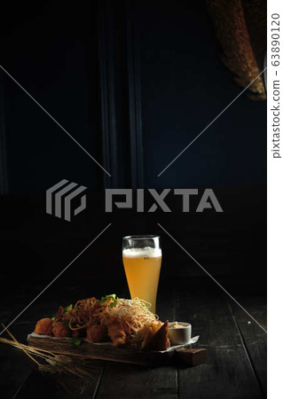 Glass of cold beer with appetizer. catering menu Glass of cold beer with appetizer. catering menu 63890120